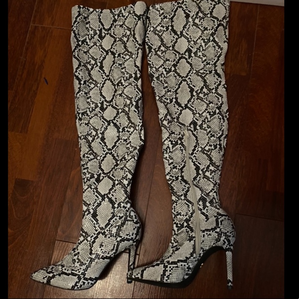 Snakeskin High boots